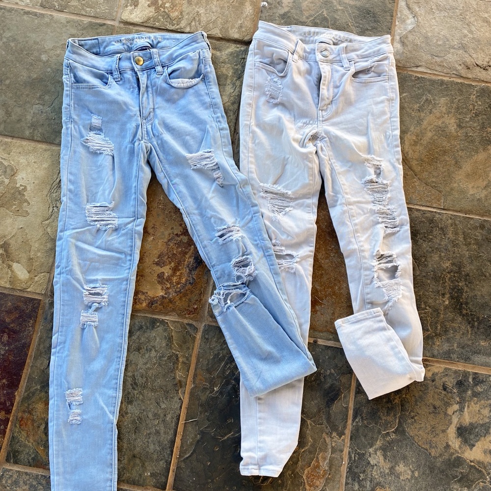 2 pairs of American Eagle jeans.